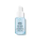 A clear glass dropper bottle of Kiehl’s Clearly Corrective Re-Texturizing Triple Acid Peel Serum with blue liquid, shown on a white background.