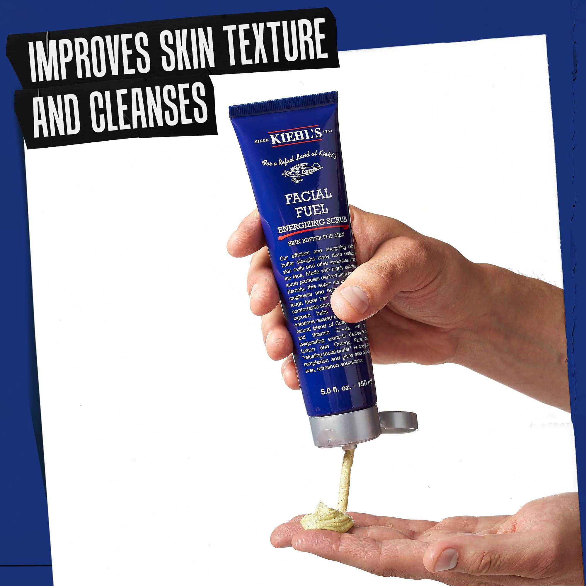 A hand dispensing Facial Fuel Energizing Scrub. Text highlights "Improves Skin Texture and cleanses"