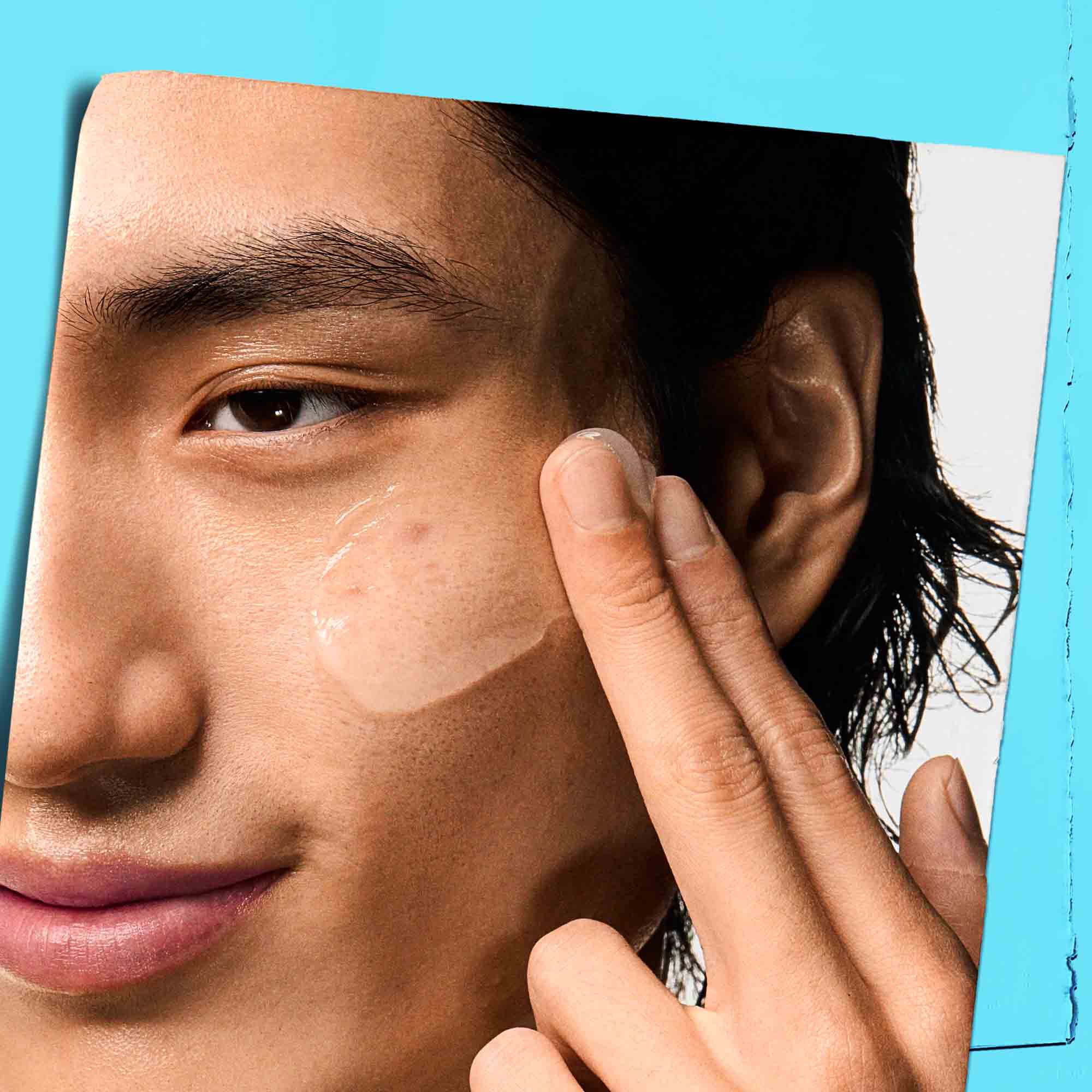 Ultra Facial Oil-Free Gel Cream swiped across a model's face.