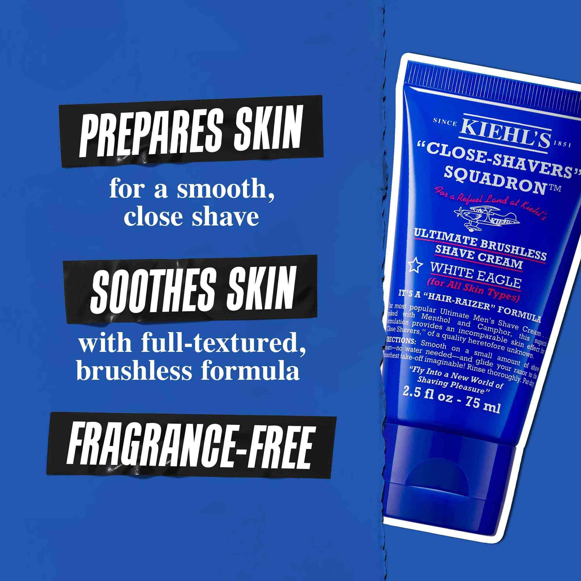 A tube of Ultimate Brushless Shave Cream White Eagle against a blue background. Text reads "Prepares skin for a smooth, close shave," "Soothes skin with full-textured brushless shave," and "Fragrance-free."
