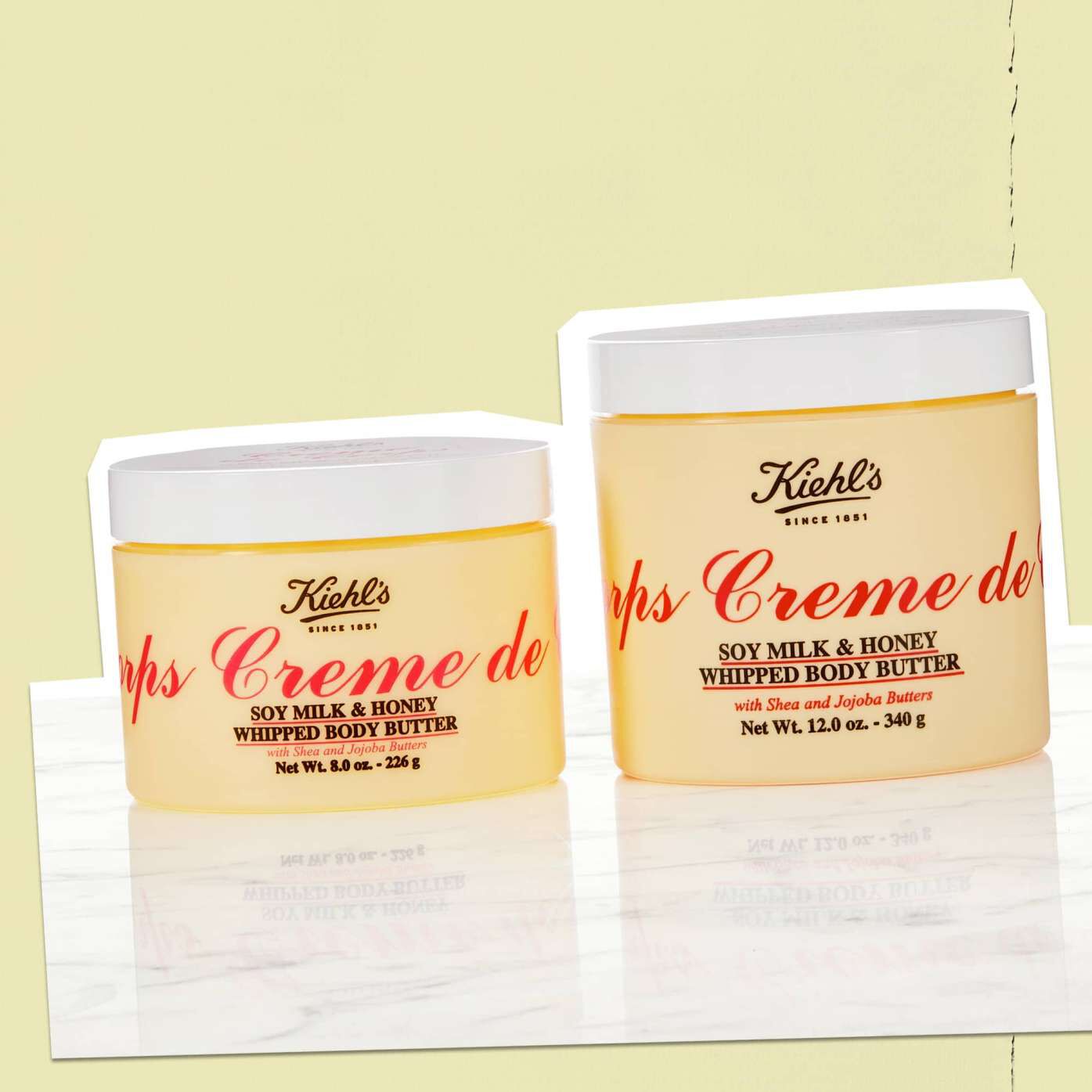 Two bottles of Creme de Corps Whipped Butter Body Butter illustrating available sizes