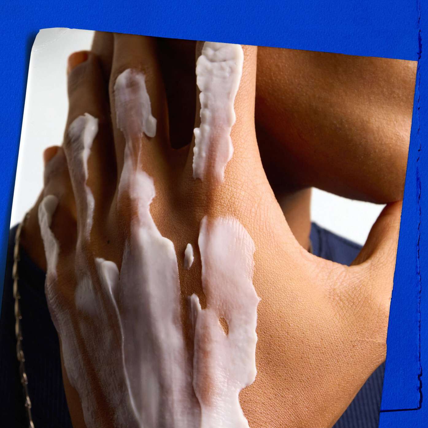 Texture sample of a model's hand with Kiehl's Ultimate Strength Hand Salve