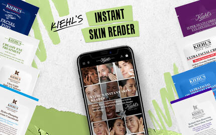 A graphic featuring a smartphone displaying the "Kiehl's Instant Skin Reader" webpage, surrounded by various product samples and a QR code with a prompt to scan and get started.