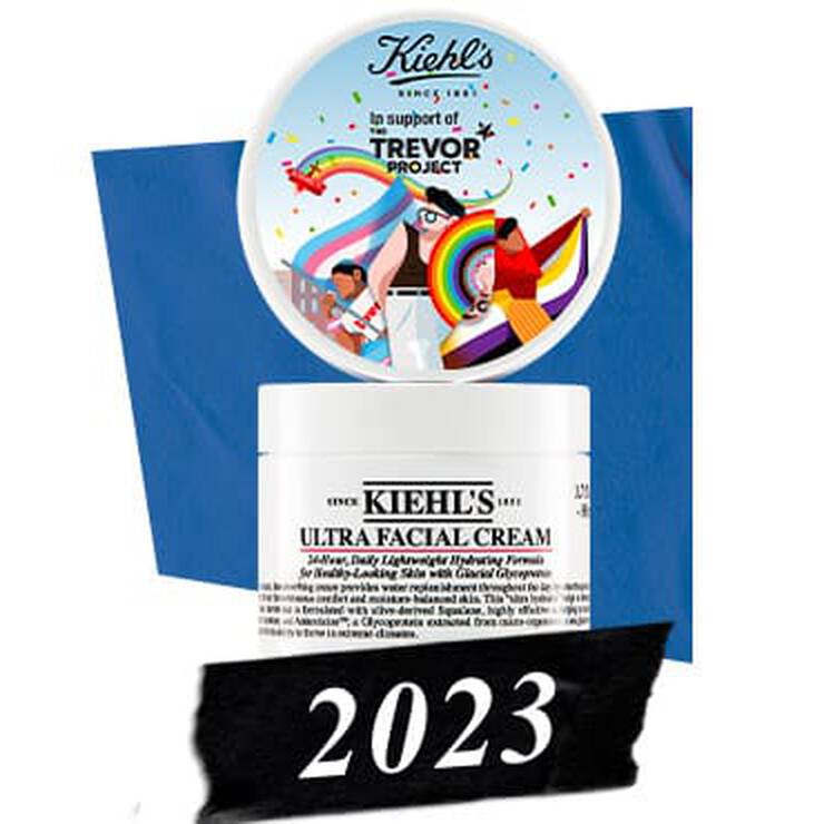 Kiehl's Ultra Facial Cream with a colorful cap supporting the Trevor Project, set against a blue background, marked 2023.