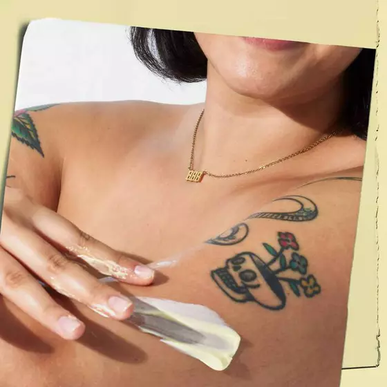Woman applying Kiehl’s Creme de Corps, demonstrating how you can treat eczema
