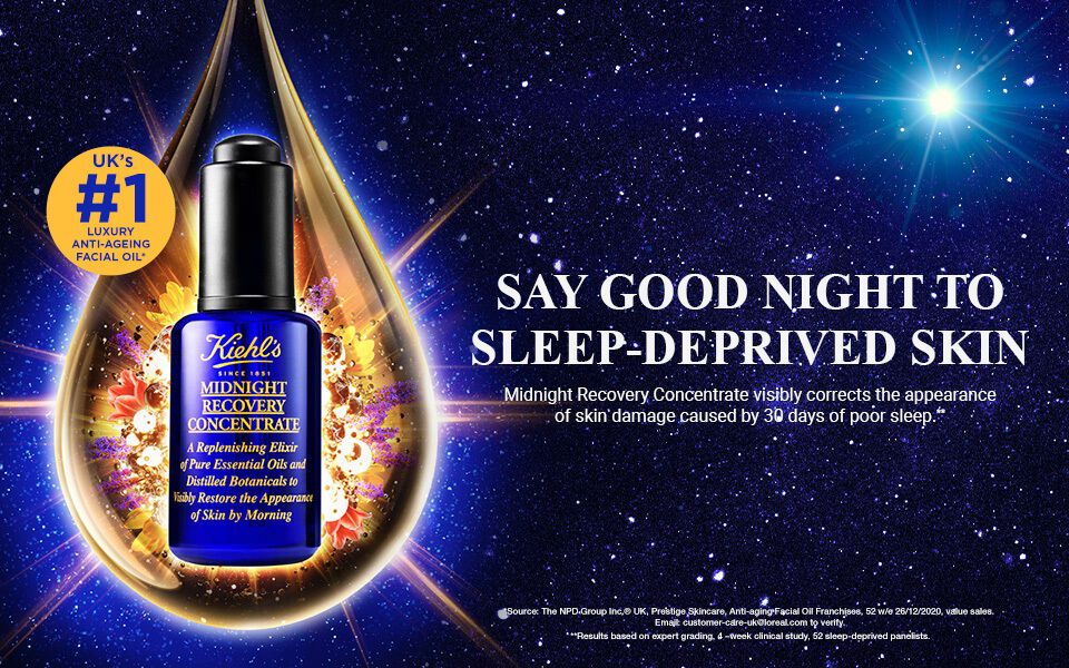 An advertisement featuring a luxury facial oil called "Midnight Recovery Concentrate," highlighting its benefits for skin affected by sleep deprivation. The background has a cosmic theme with stars, and the text promotes the product as the UK's number one luxury item in its category.