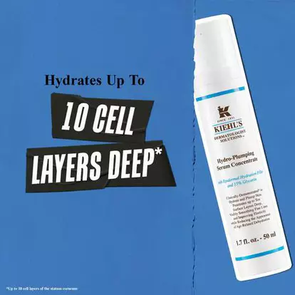 A bottle of Kiehl's Hydro-Plumping Serum Concentrate is set against a blue background. Text reads, "Hydrates Up To 10 Cell Layers Deep." The tone is informative.