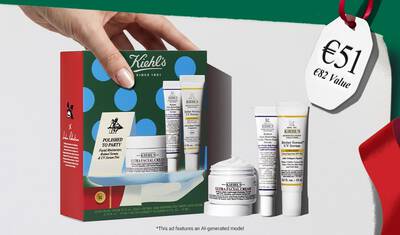 Hydrating Holiday Hits" skincare gift set on a green background, featuring Ultra Facial Cream and Creamy Eye Treatment with Avocado in festive packaging.​