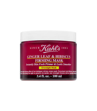 A burgundy jar of Kiehl's Ginger Leaf & Hibiscus Firming Mask, 100 ml, labeled as an overnight skin treatment.